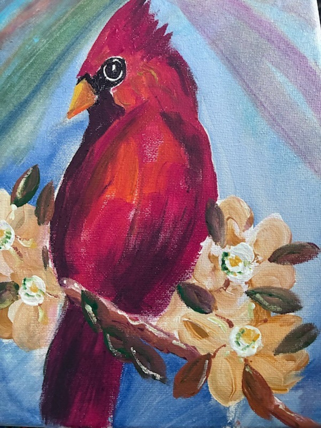 Student acrylic painting of a red cardinal among blossoms