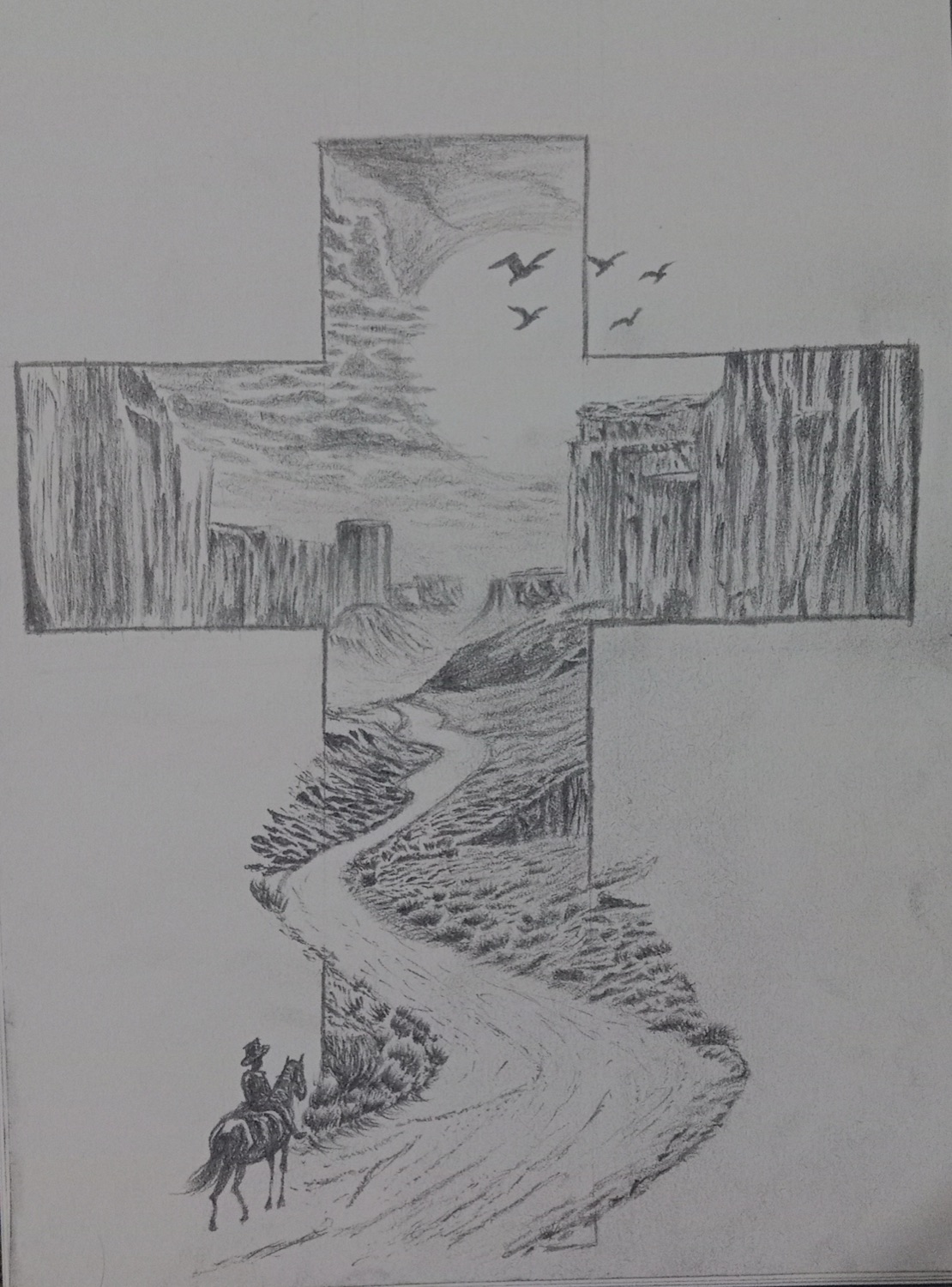 Student pencil drawing of a desert trail framed within a cross