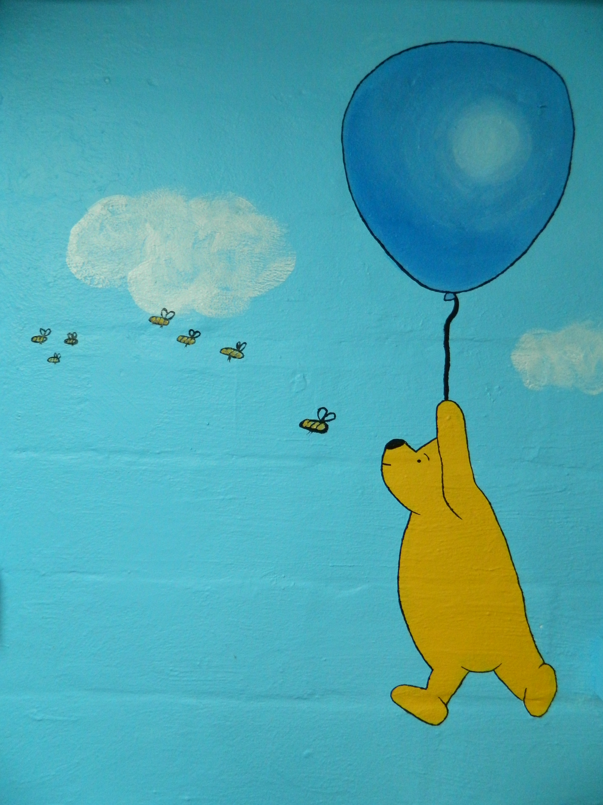 Winnie the Pooh and balloon nursery mural